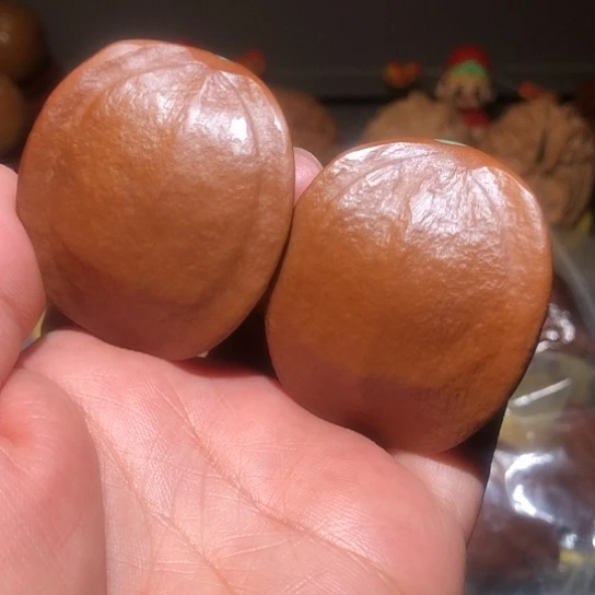 文玩核桃把件镶嵌三角橄榄