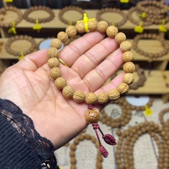 木质野生桃核手串