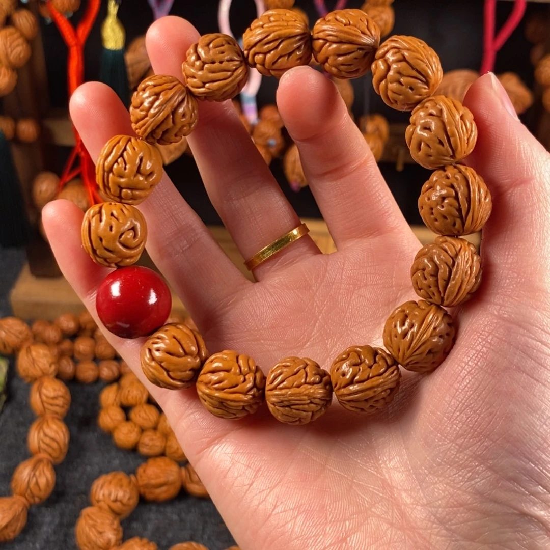 吊坠桃核9链接桃枭手串