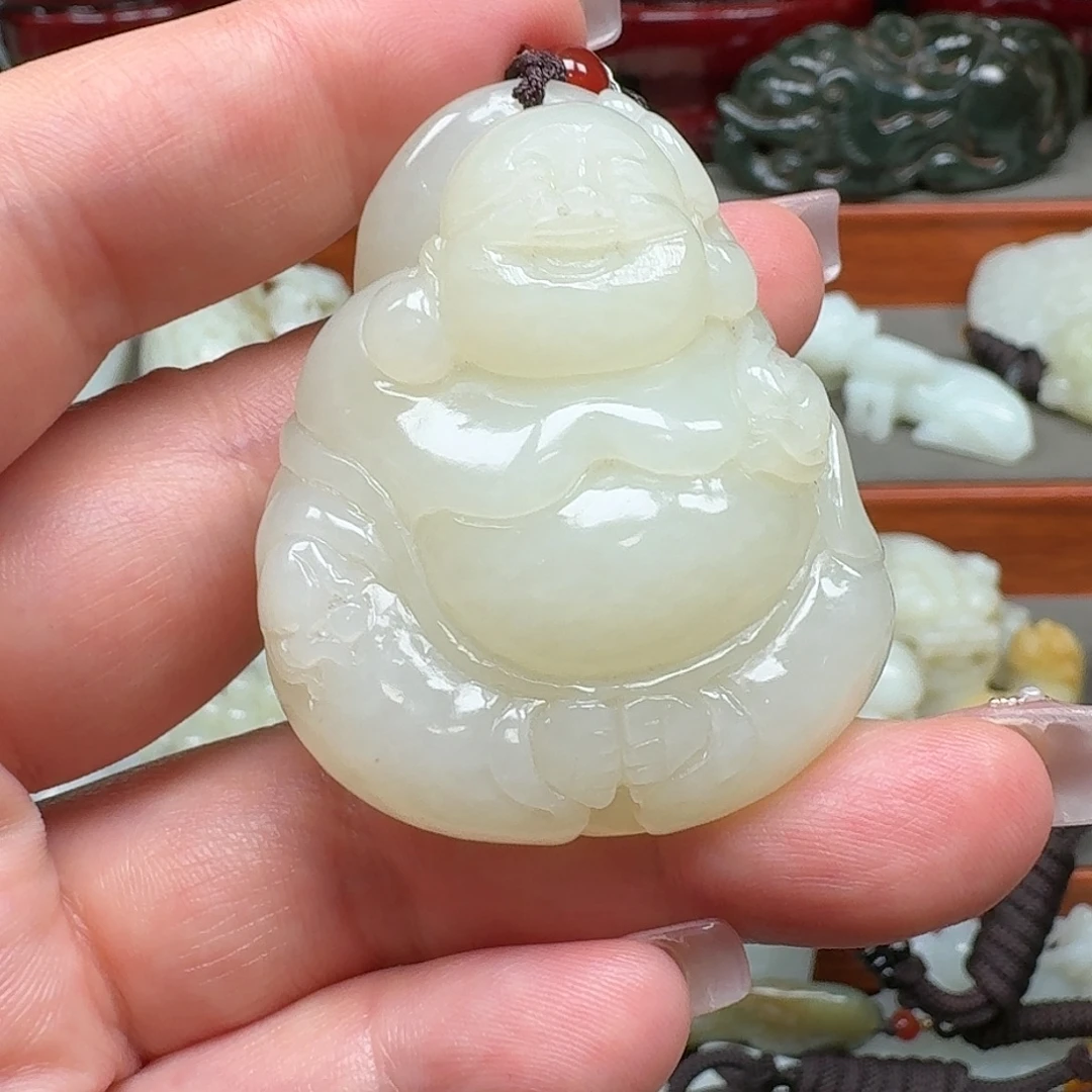 杨***明和田玉未镶嵌挂件