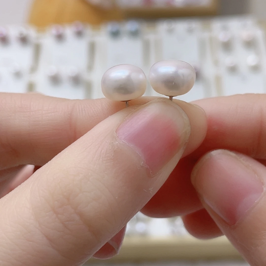 爱***华银S925镶嵌耳饰淡水珍珠