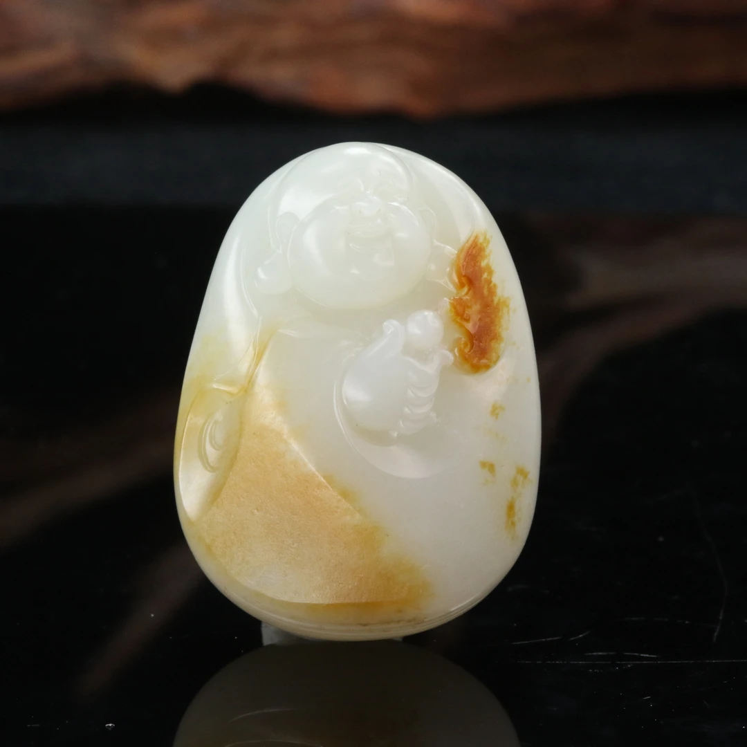 49和田玉红皮佛公（候晓峰作）/001184北京中保拍卖