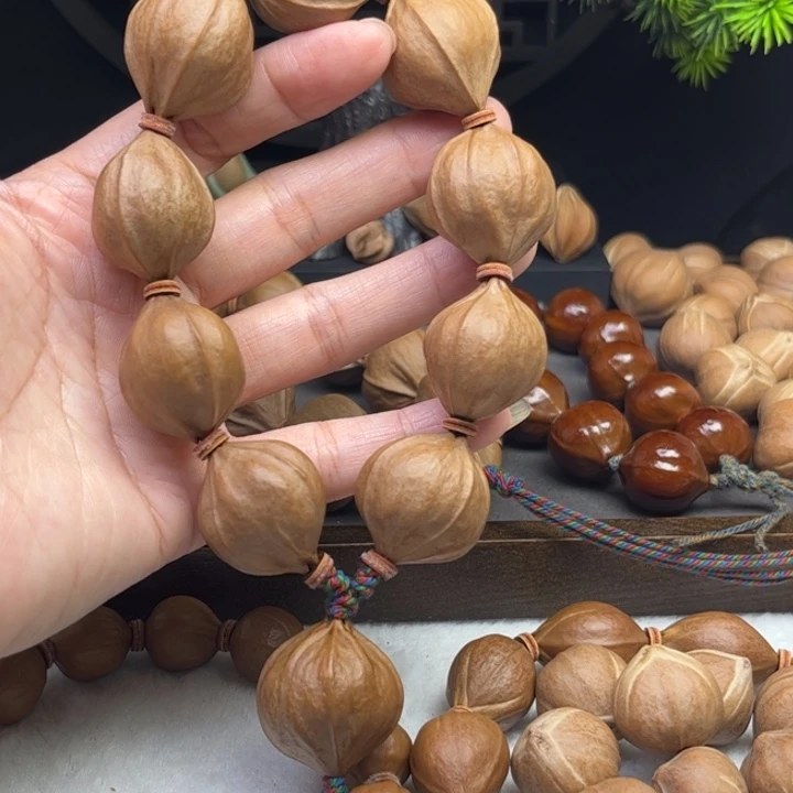 大***海橄榄核手串/手链2.5*2.6原皮四花铁核10颗