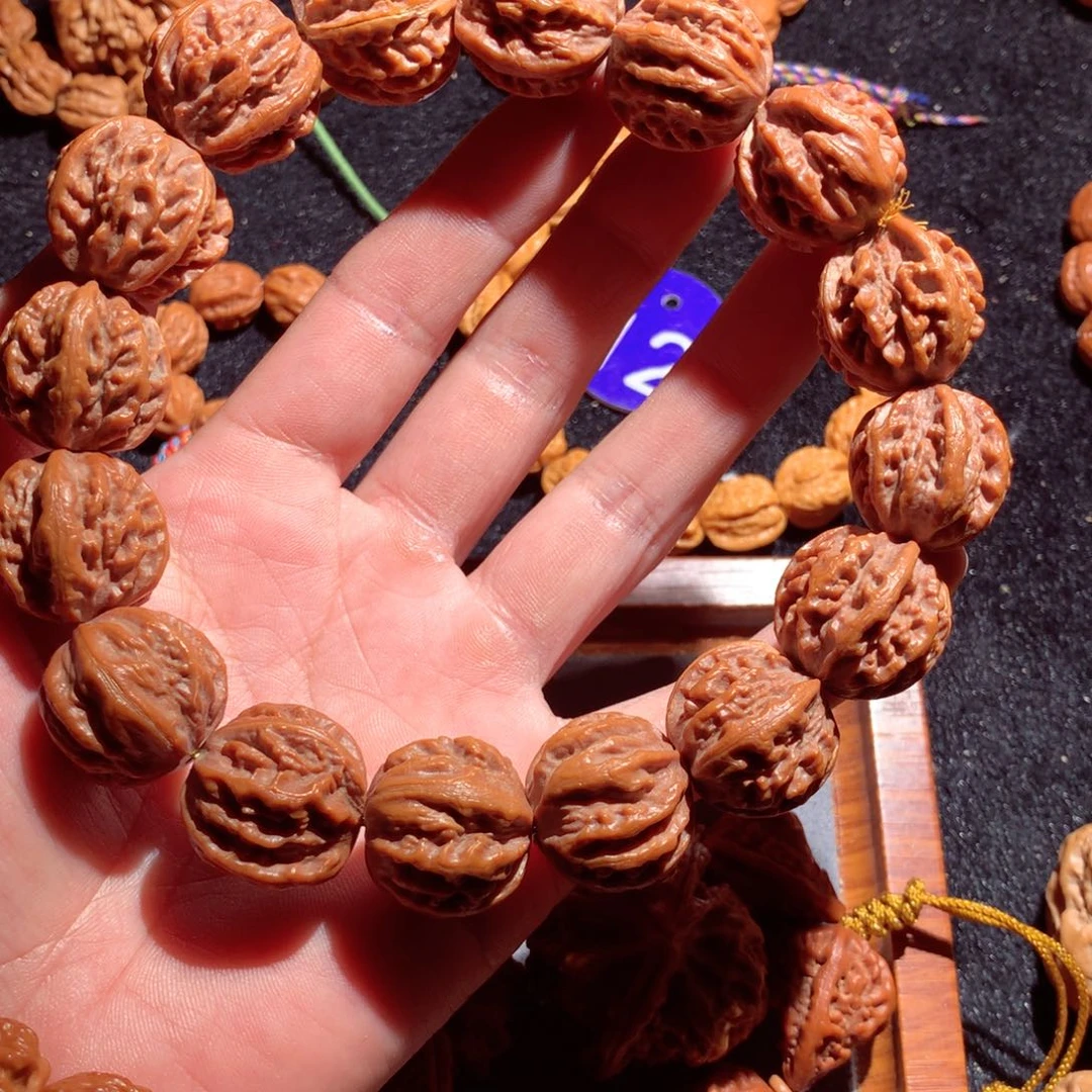 草***木文玩核桃把件龙脊八棱瑕疵串不退