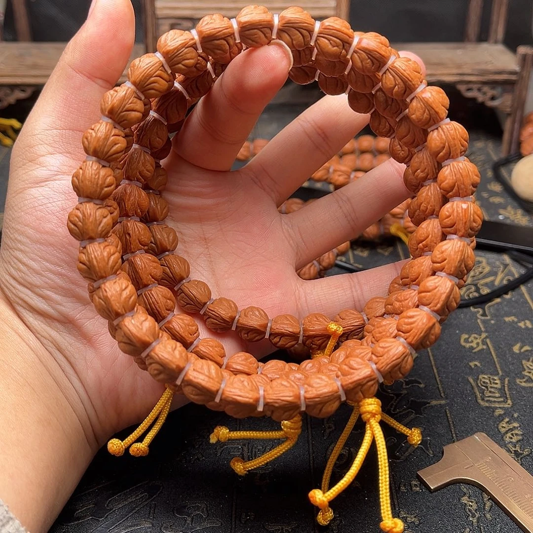 桃核吊坠玉龙手持