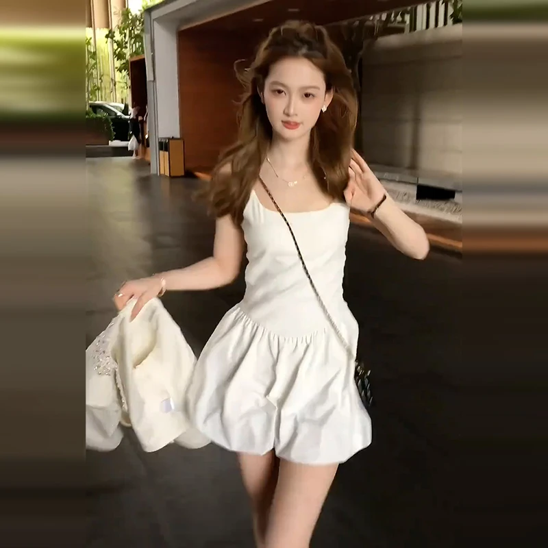 0831气质赫本风芭蕾吊带连衣裙子女夏2025新款高级感收腰花苞短裙