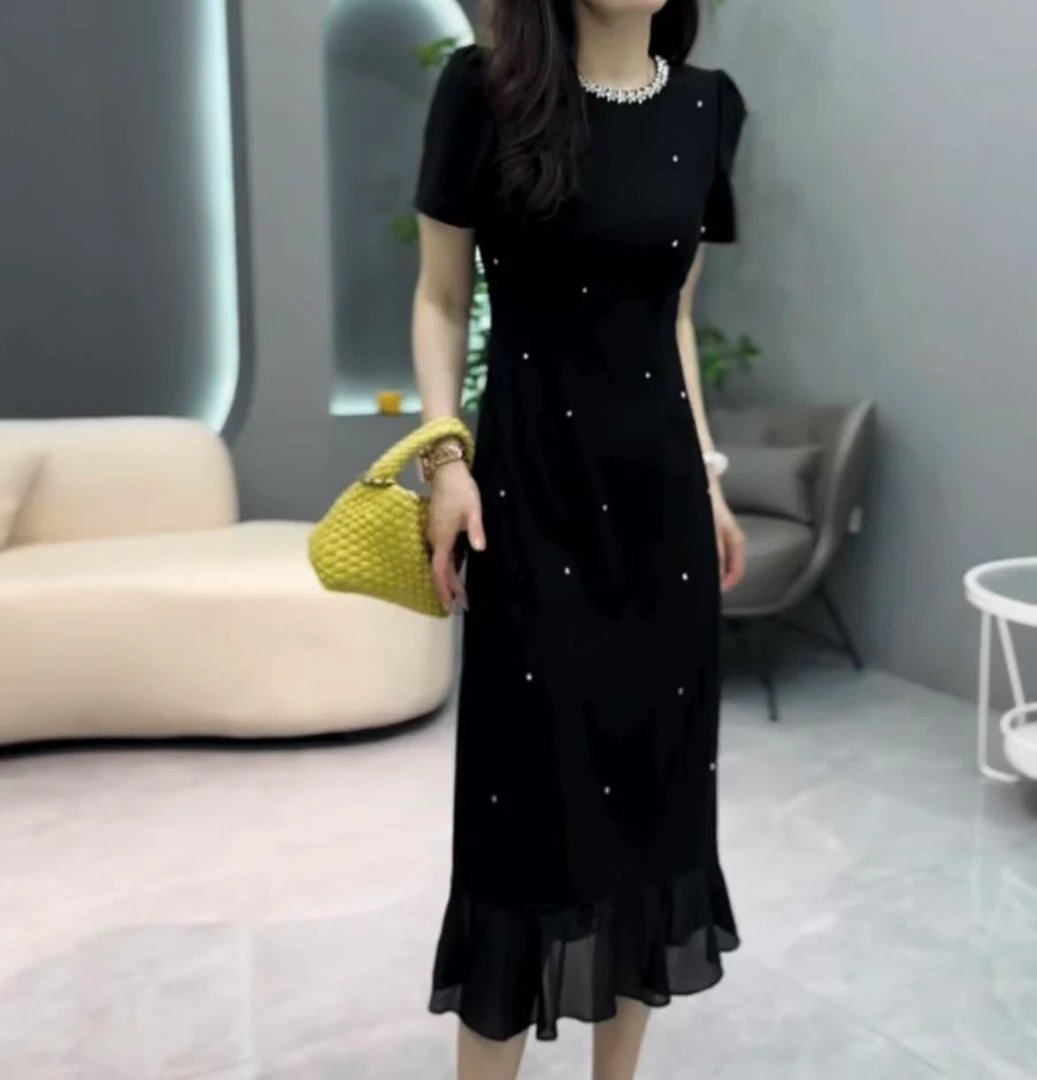 赫本风黑色连衣裙2025夏新款鱼尾裙收腰气质高级短袖长款裙子女