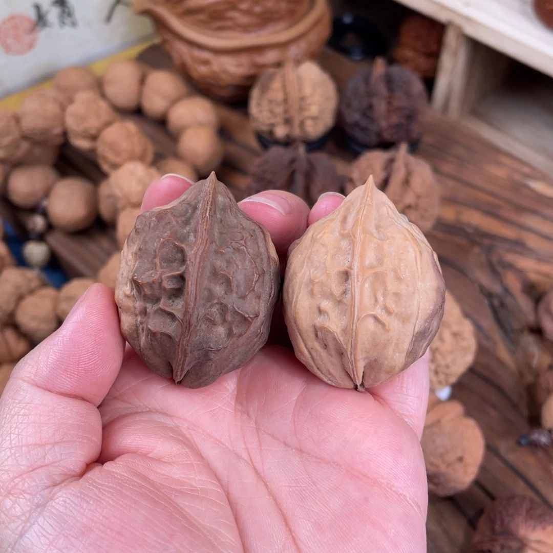 吉***意文玩核桃把件树纹鸡心