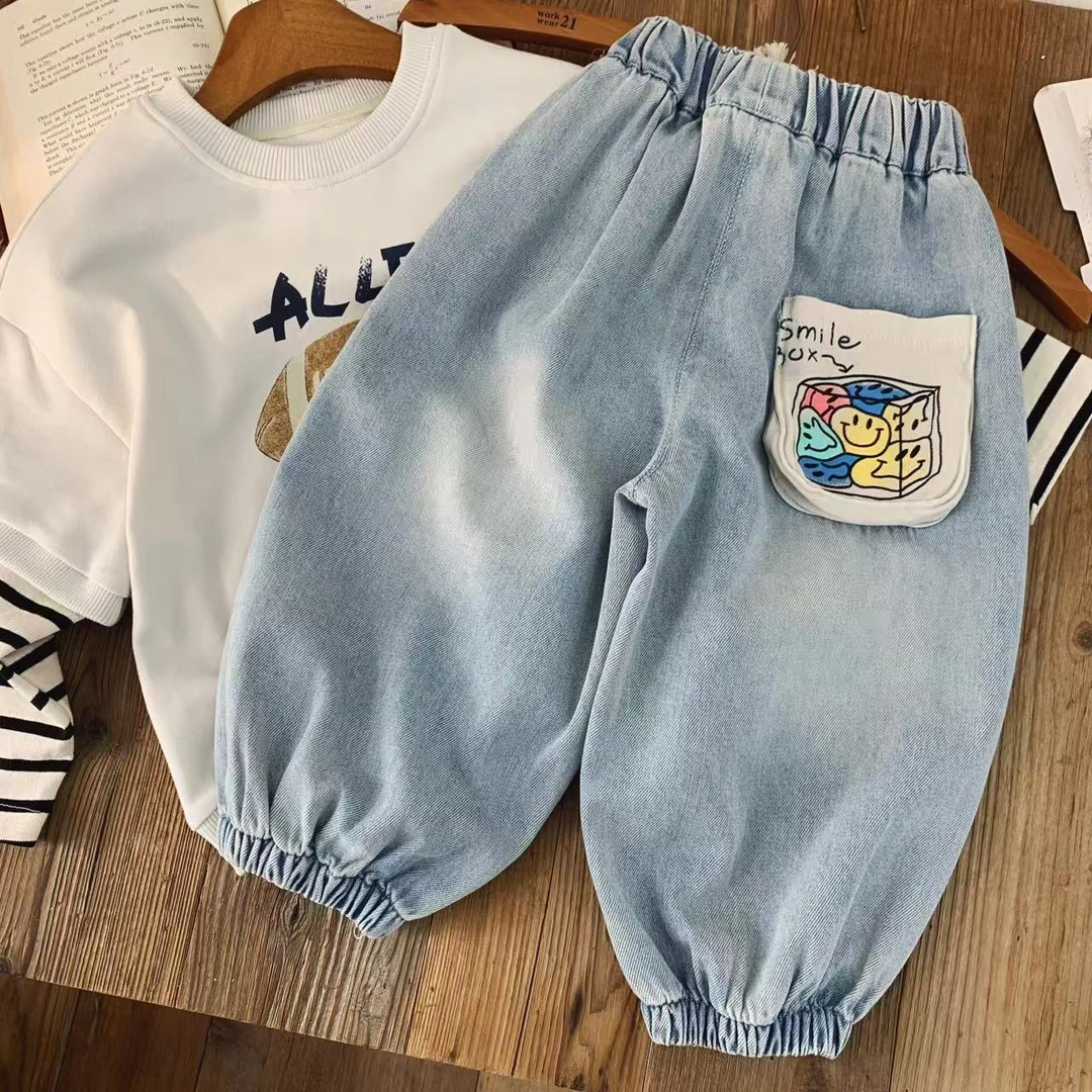 春秋儿童牛仔裤学生2025新款束脚裤百搭柔软卡通印花中小童时尚