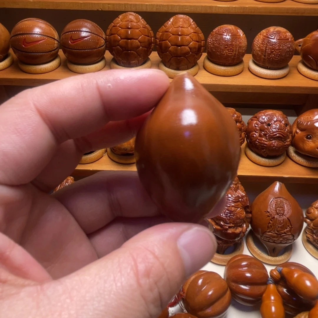 桥***橄榄核把件单面生命源