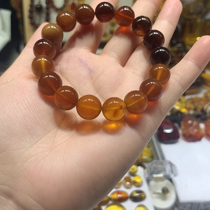 喜***开未镶嵌琥珀手串红蜜彩虹手串