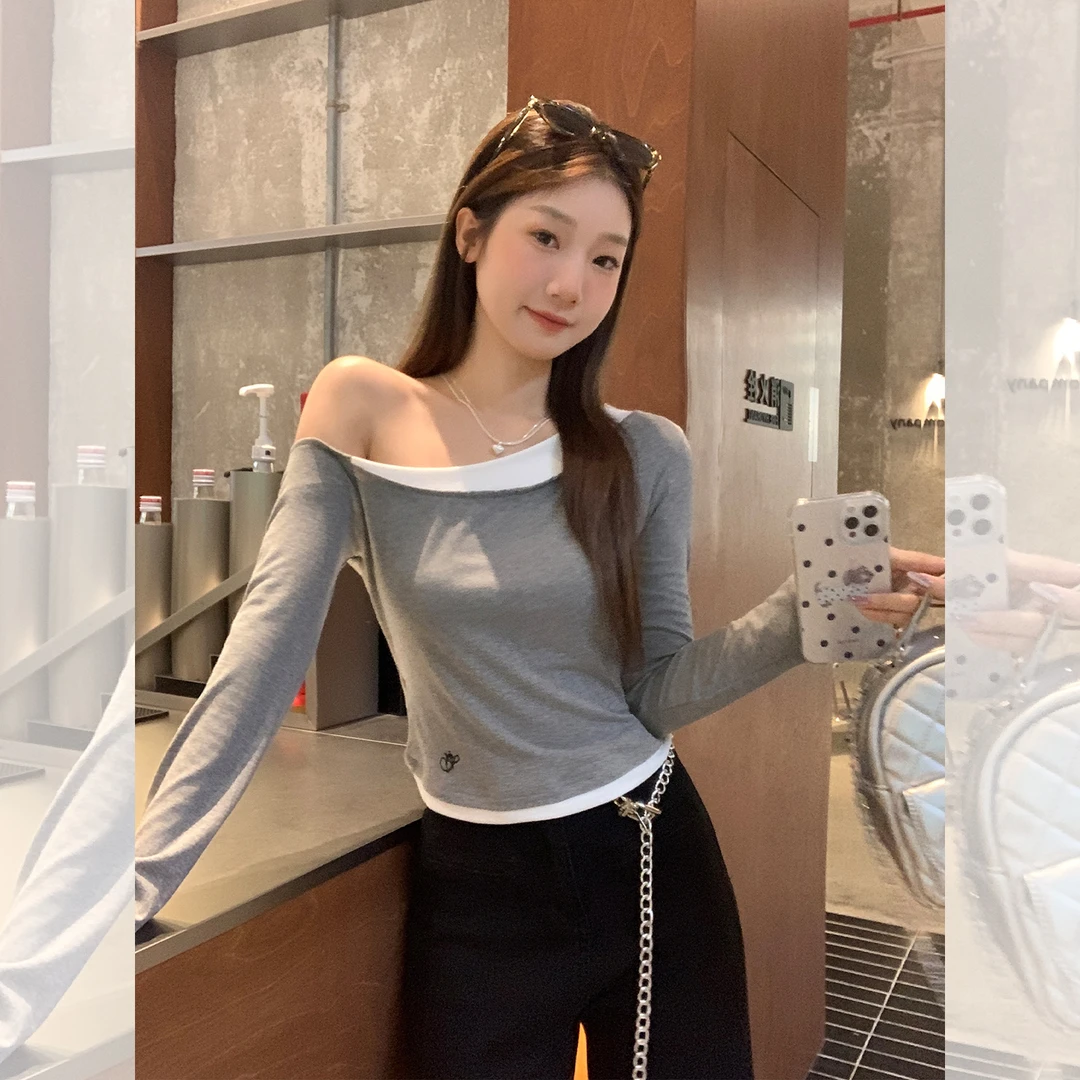 时尚气质灰色斜肩假两件刺绣设计长袖T恤女秋季新款甜辣露肩上衣