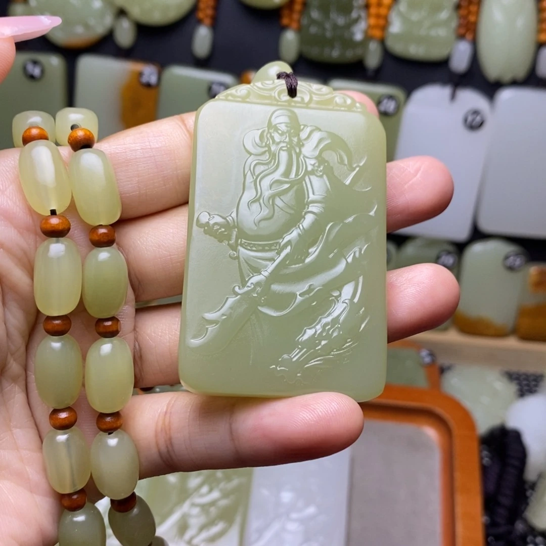 江*方解石玉关公牌子