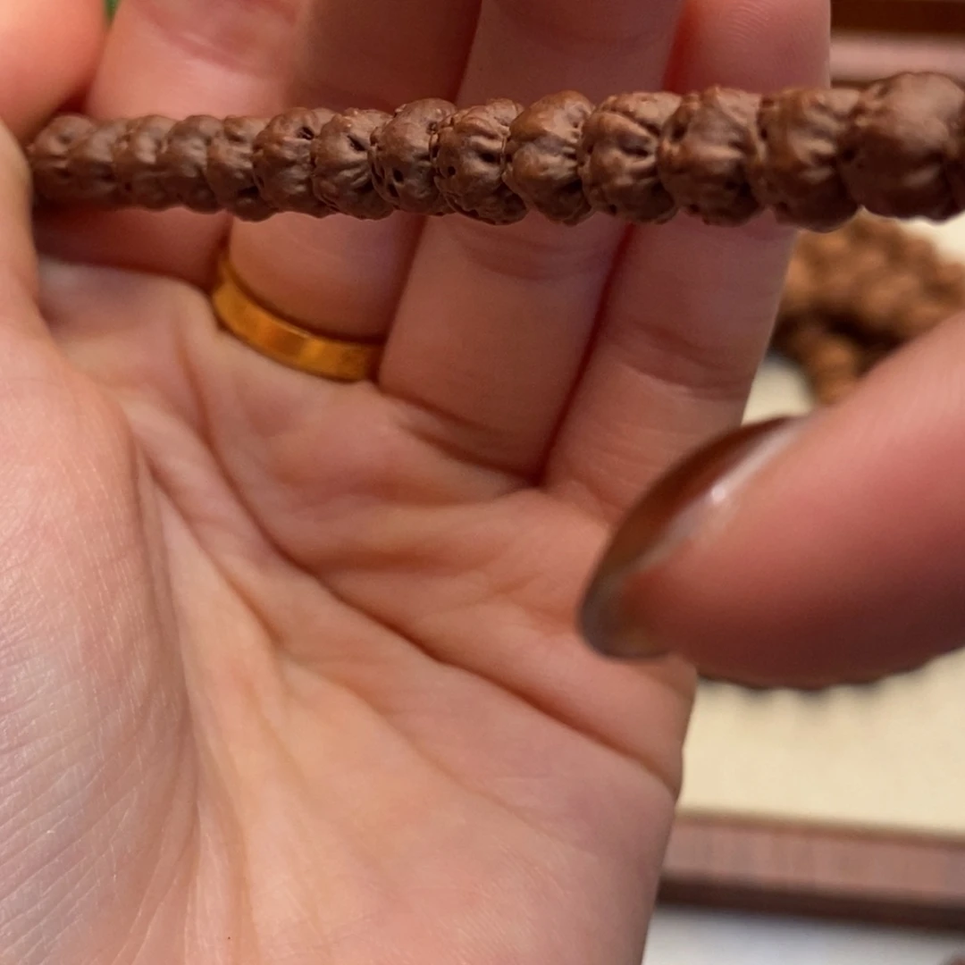 夏***目金刚菩提吊坠佛手