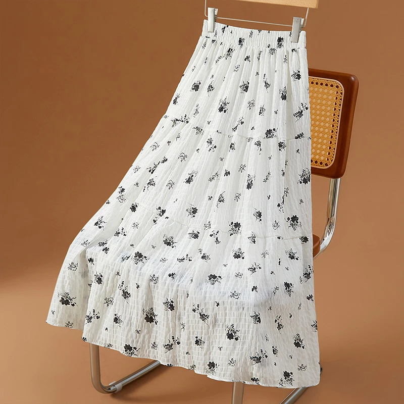 她池2025夏季新款女装时尚中长款松紧腰拼接碎花半身裙T52X2448B