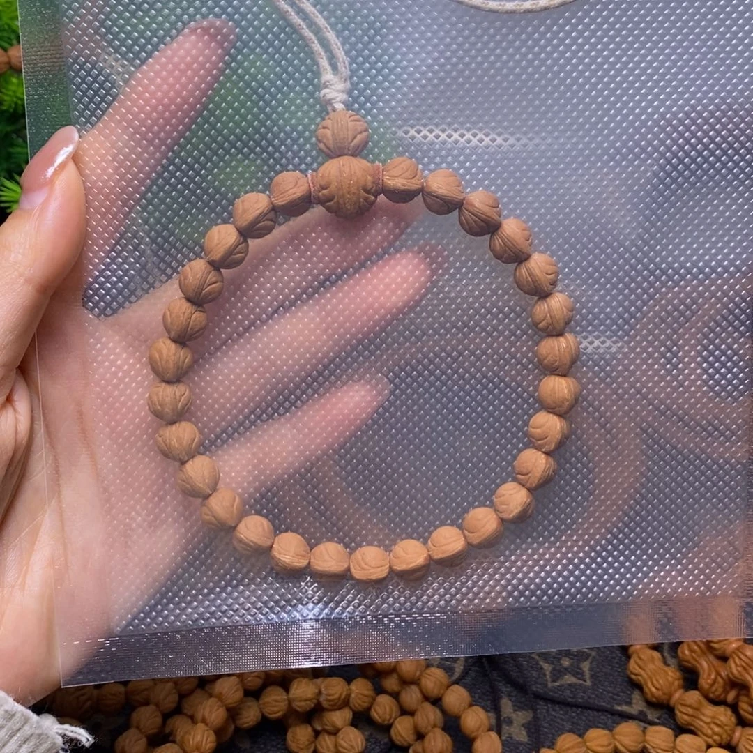 你***柴桃核手串秦岭桃核