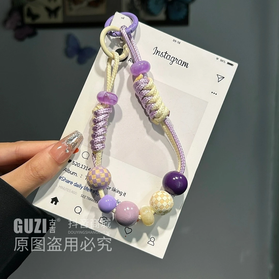 手机链挂手腕手机挂绳新款不规则格子圆珠撞色编织绳公仔挂件原创