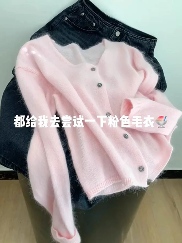 慵懒风粉色毛衣女装2025秋季款高级感超好看独特减龄针织镂空上衣