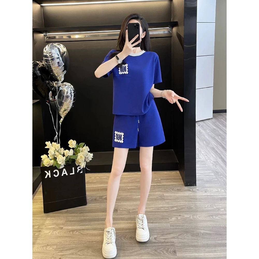蓝色运动休闲套装女夏季2025新款宽松洋气减龄炸街短袖短裤两件套