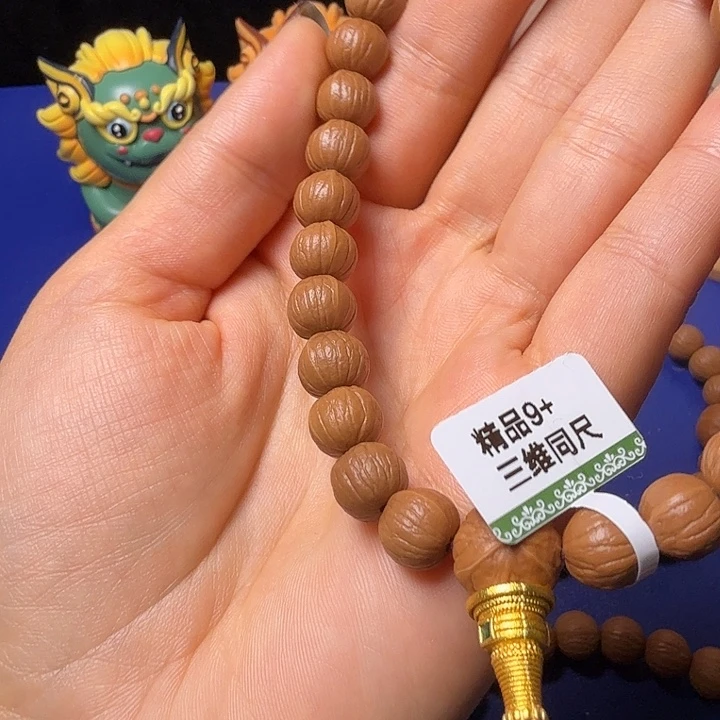 淘***童手串猴头核桃凤羽