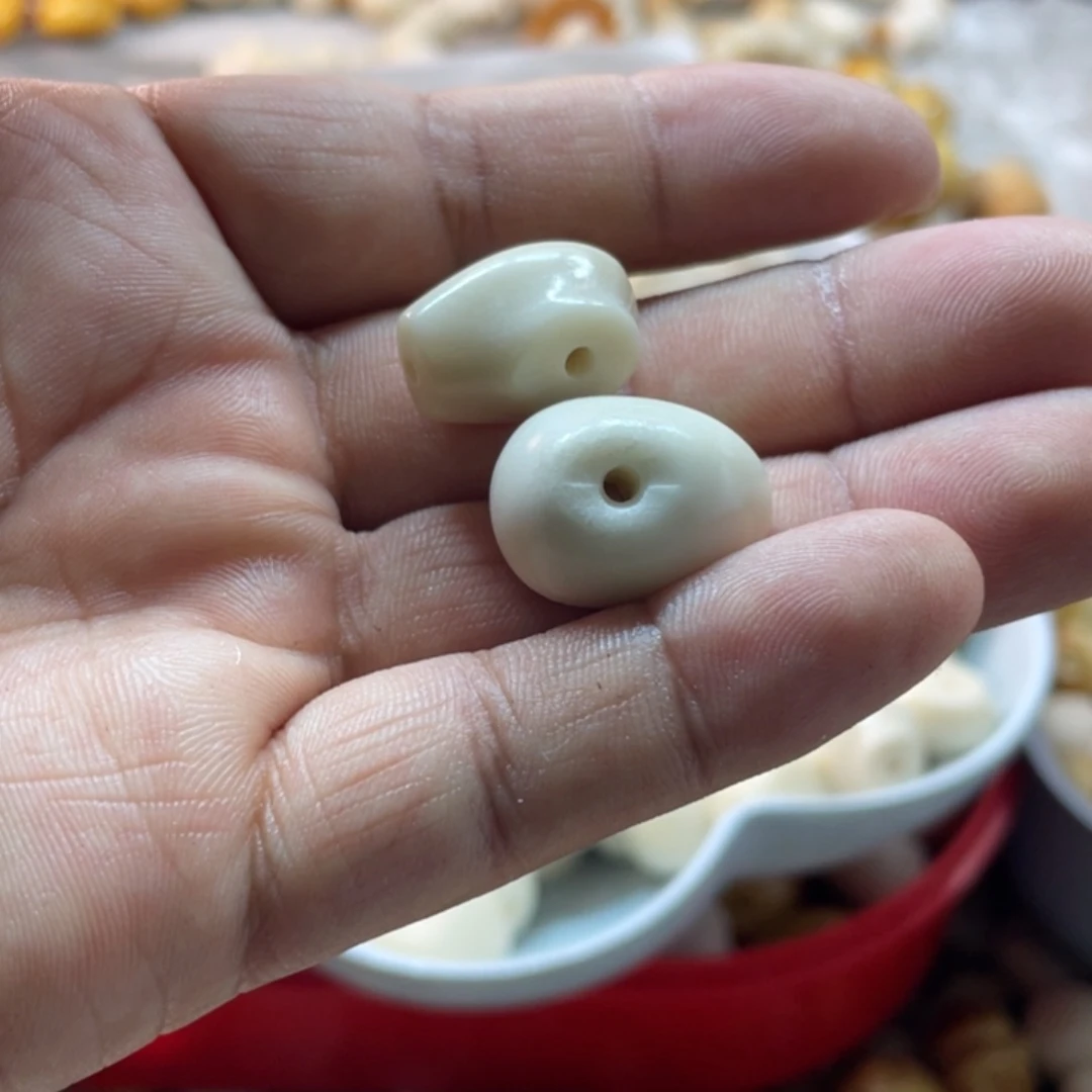 煜***菩提根/象牙果吊坠微瑕象牙果三通二个