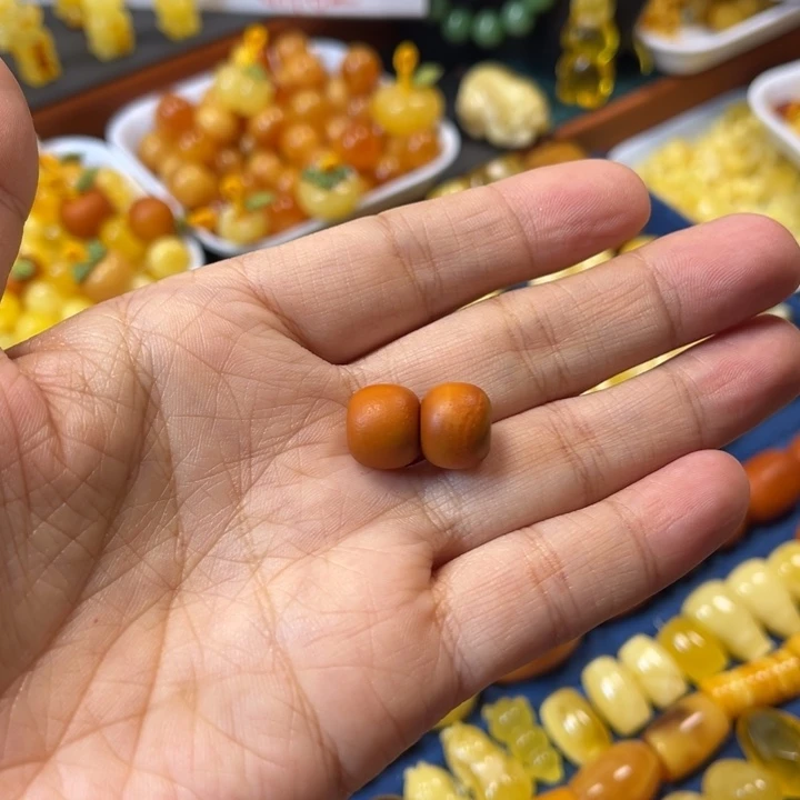 琥珀未镶嵌裸石卡11大加老蜡橘皮墩一对