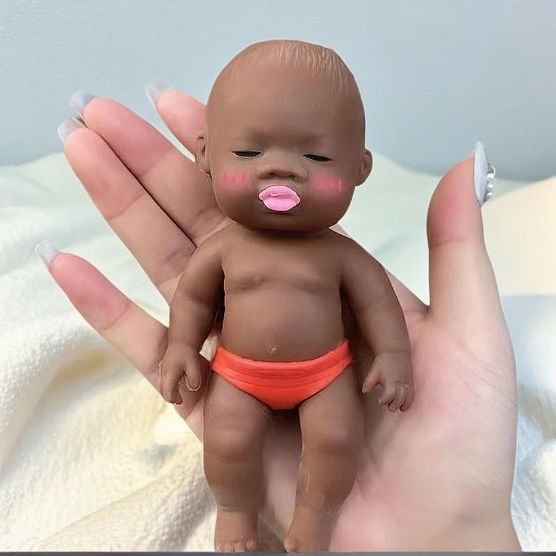 解压娃娃掌心捏捏乐黑人搞怪减压神器可爱男孩迷你网红沙雕拉拉乐