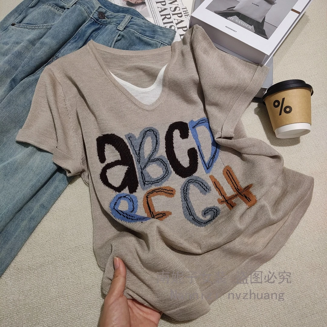 南妮子女装短袖女款爆款2025新款宽松显瘦字母提花针织衫DZG8306