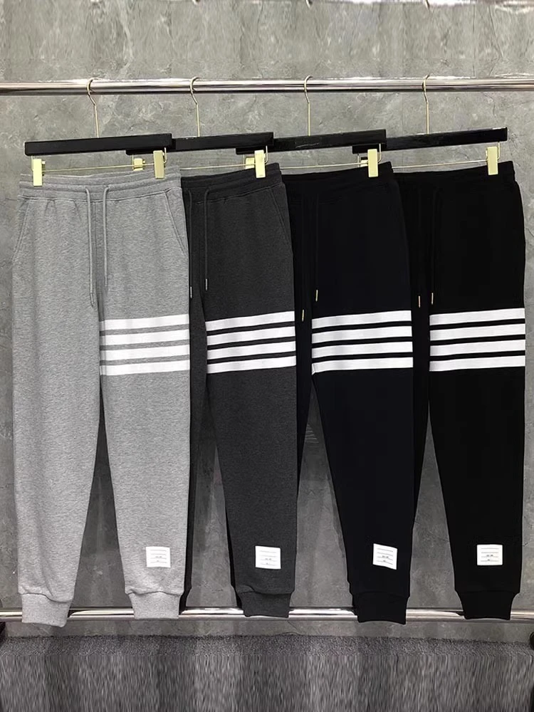 男女休闲裤秋冬经典款卫裤春秋宽松束脚直筒抽绳裤男女情侣运动裤