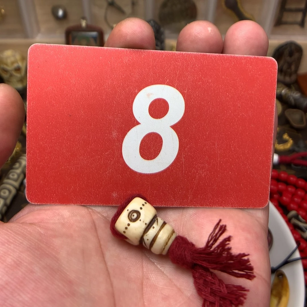 桃核吊坠(****港………………………………