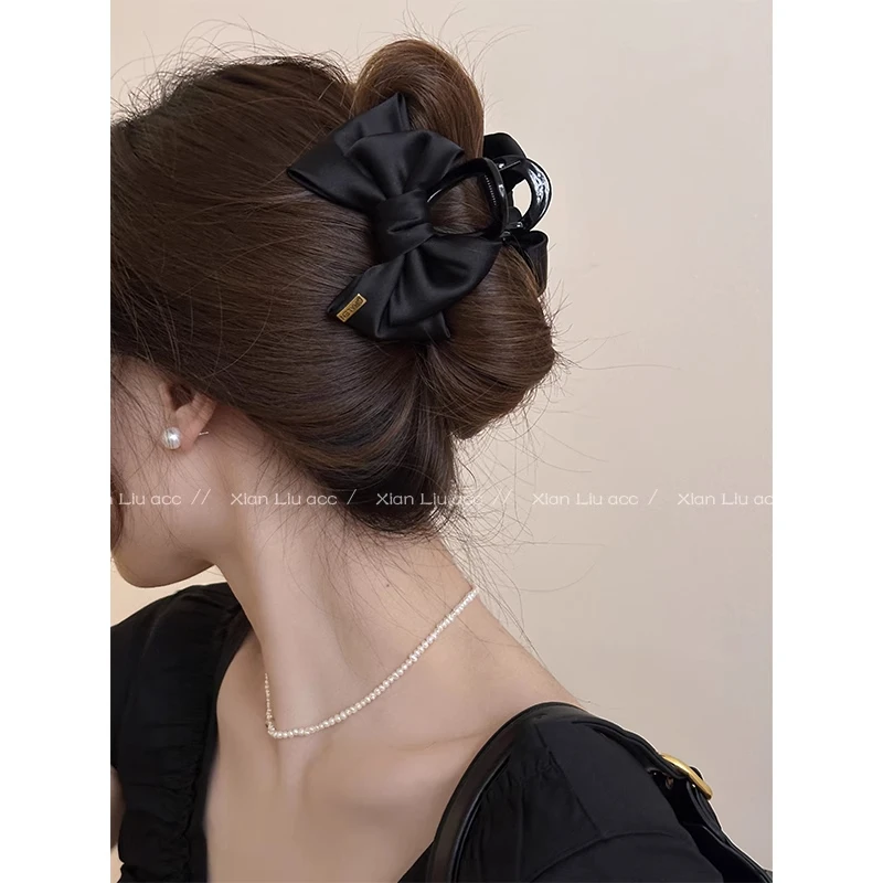 黑色金标蝴蝶结抓夹女2024新款高级感半扎发夹子头饰后脑勺鲨鱼夹