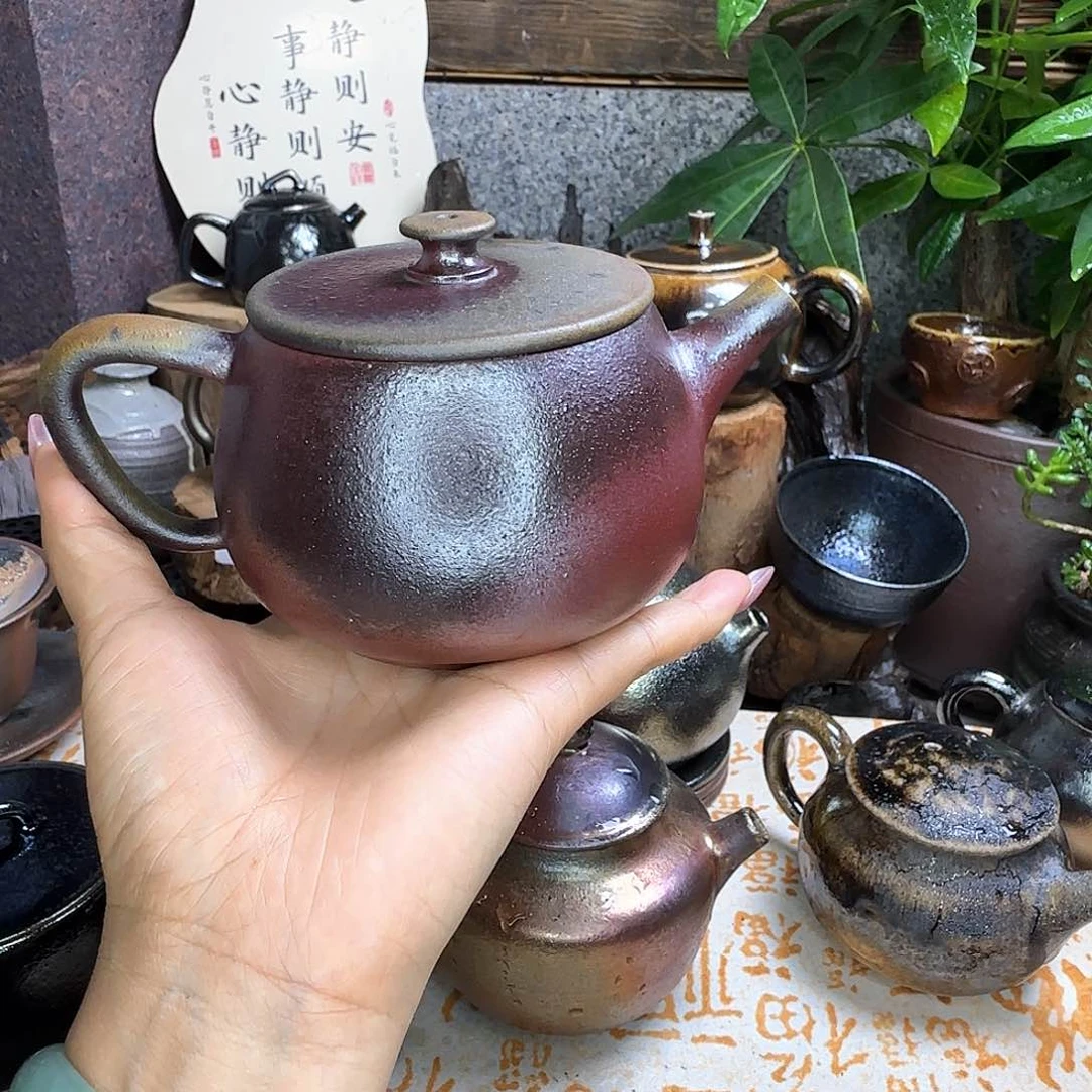 壶阿****花建水紫陶柴烧壶