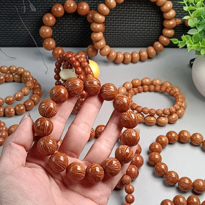 龙***师桃核手串铁籽密纹满花红魔16