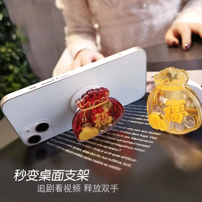 荔枝纹磨砂暴富金币伸缩气囊手机壳支架粘背贴式神器女软便携