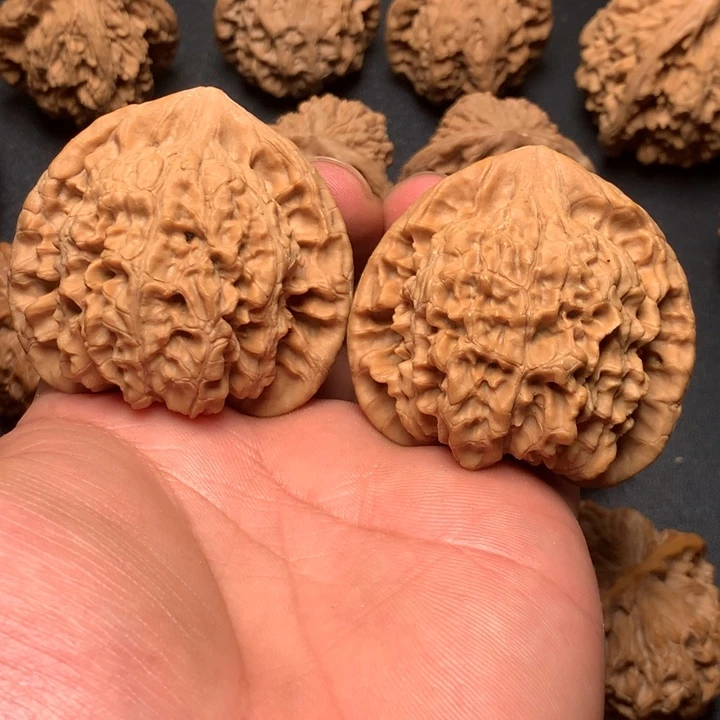 ****聪文玩核桃把件50官帽31