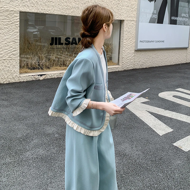 蓝色设计感时髦套装女2025春季新款花边拼接V领外套阔腿裤两件套