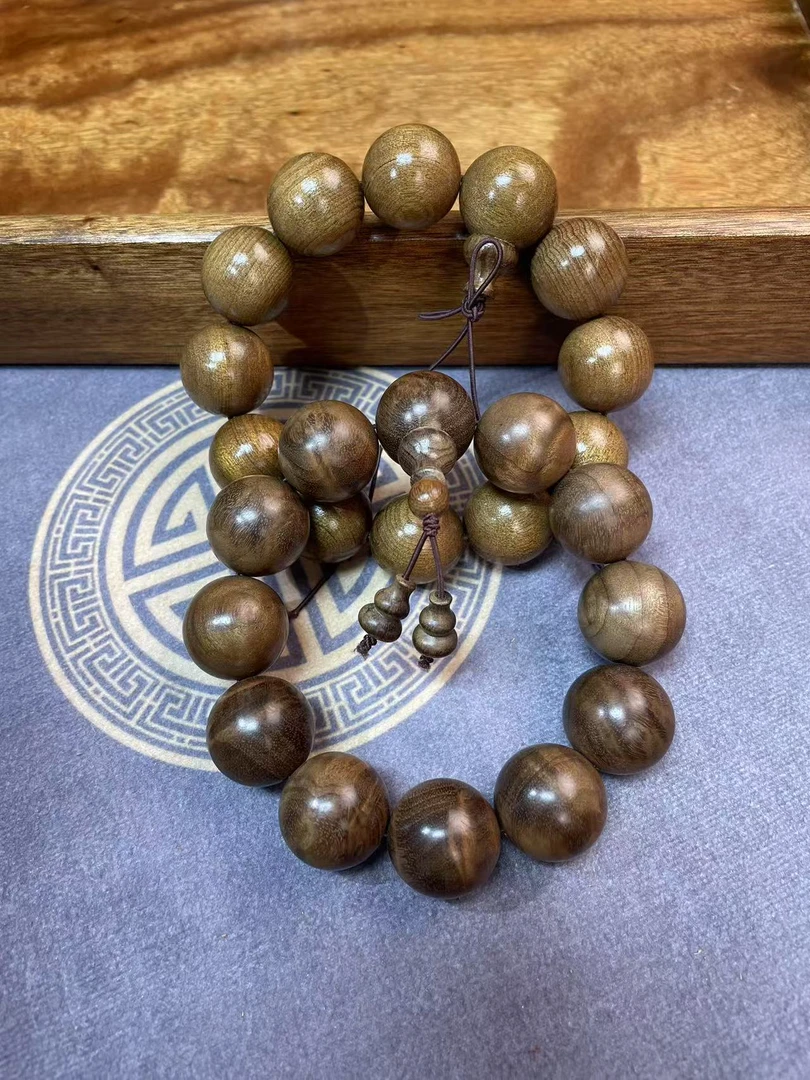 金丝楠木乌木帝王黄手串