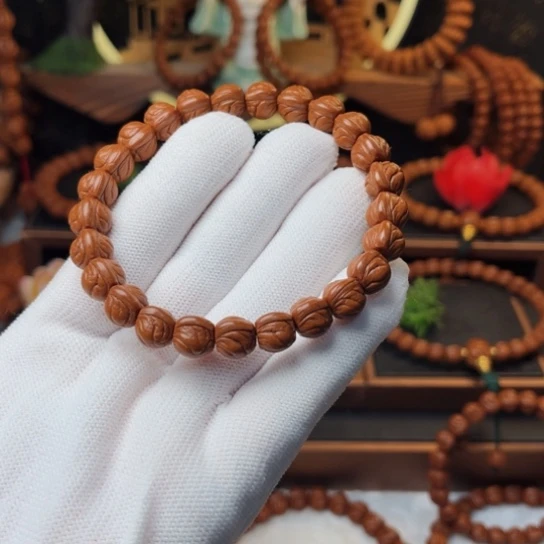 吊坠桃核麒**麟玉龙脊手串10