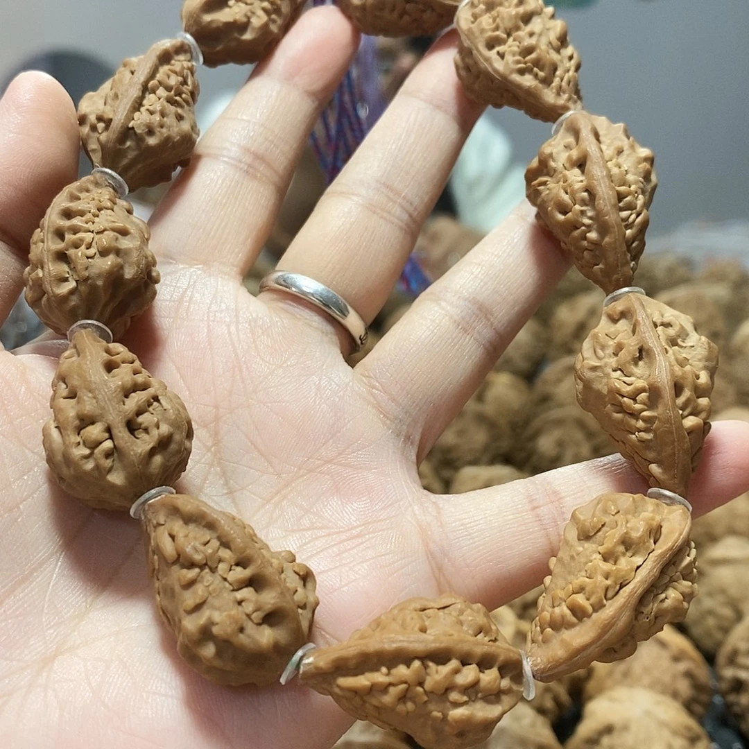 文玩核桃吊坠麒麟角