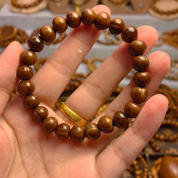 果皮天然库克精挑屁桃8*9单圈手串