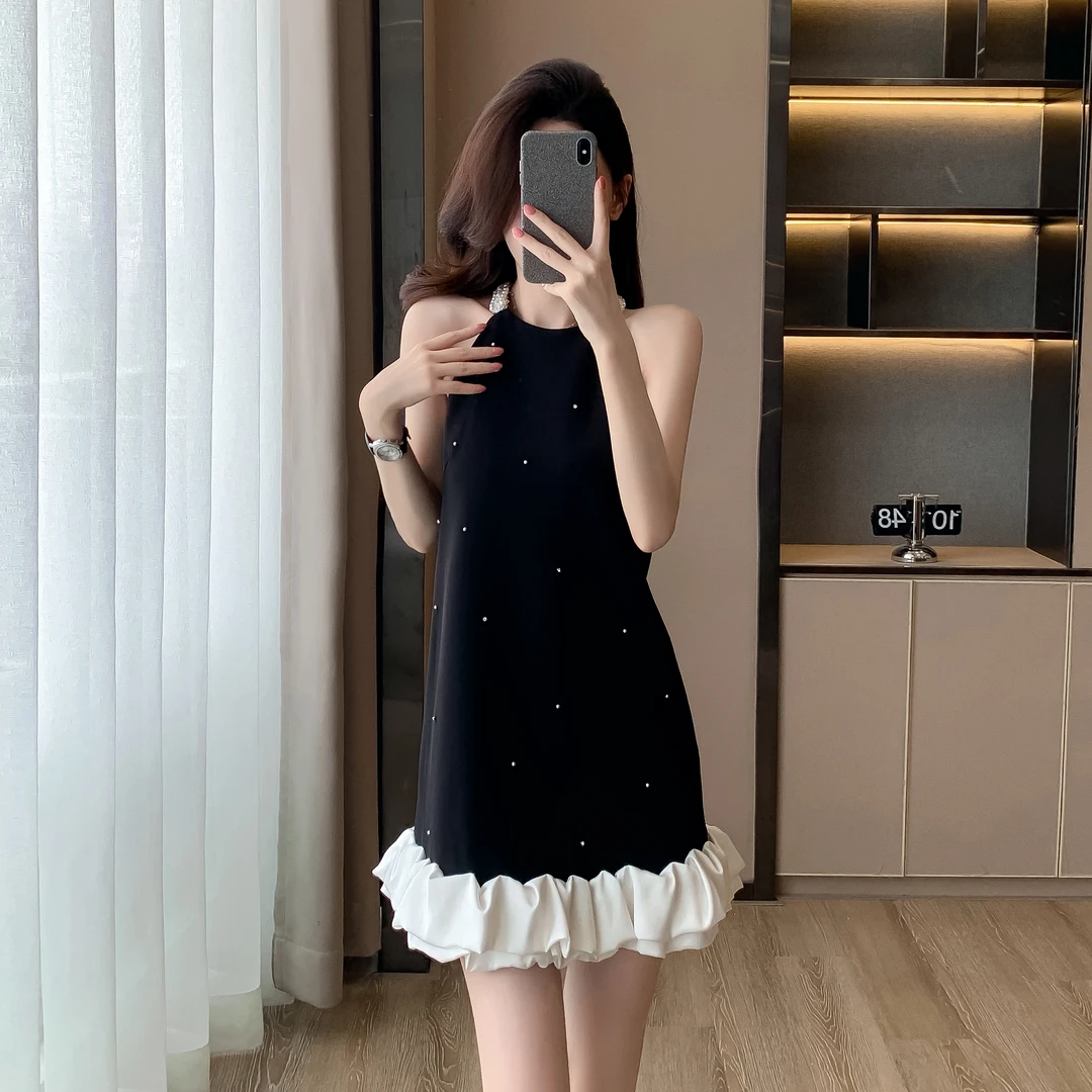 小香风连衣裙2025夏季新款女气质名媛高端显瘦法式黑色挂脖吊带裙
