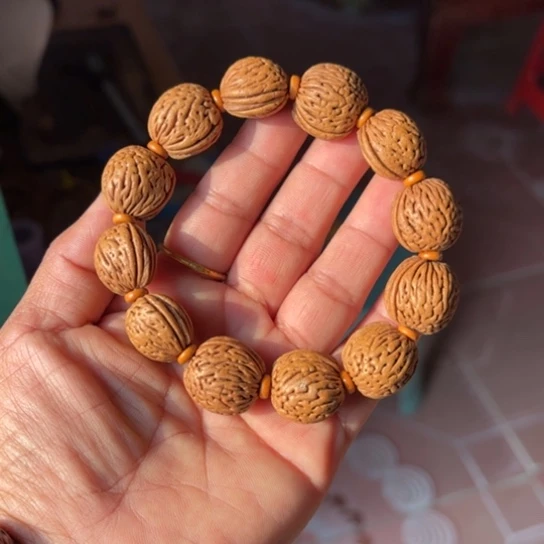 无***虑木质野生随形桃核手串