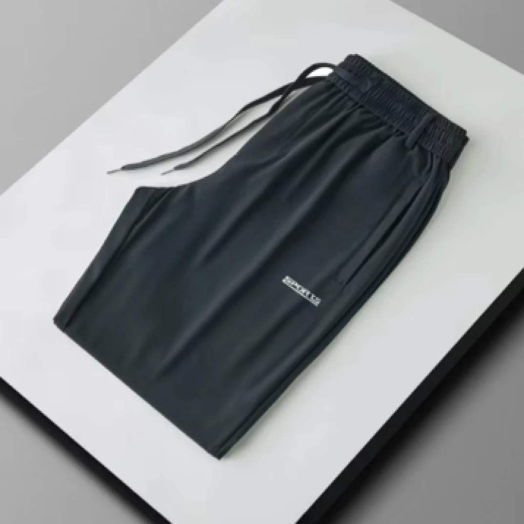 春夏男士男裤裤子纯色百搭休闲裤移圈提花抽绳裤透气