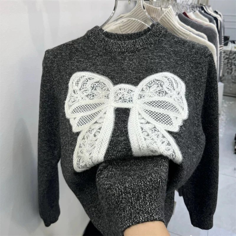 美美推荐1107新款蕾丝蝴蝶结混色圆领针织毛衣