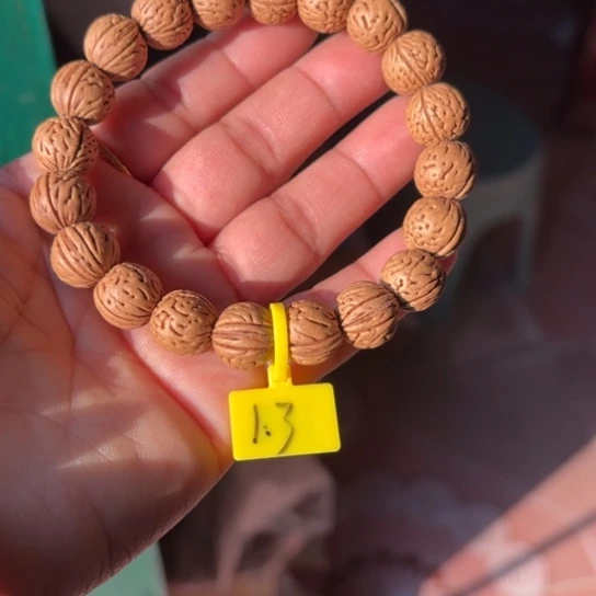 輝***木质野生桃核手串