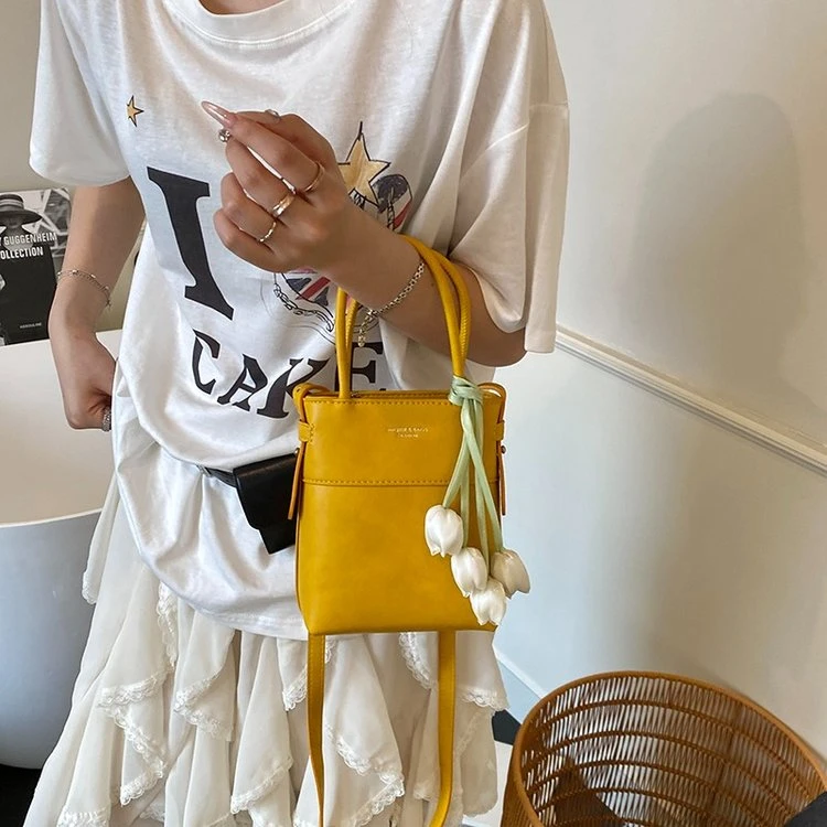 高级感洋气小包女2025新款时尚斜挎包精致小众手机包夏天水桶小包