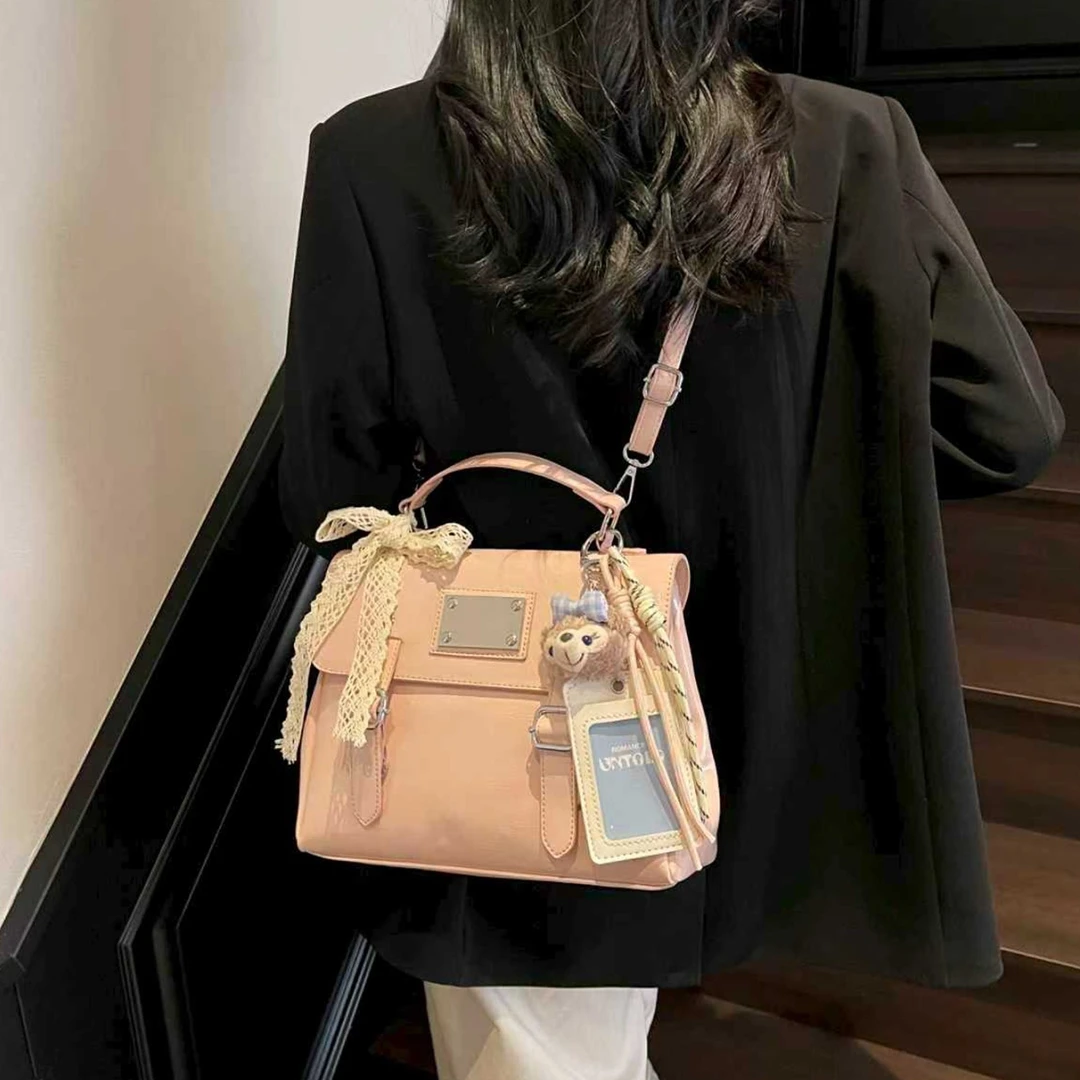 艾米兔 X COOLE女包2025新款百搭通勤简约休闲学院风手提双肩包