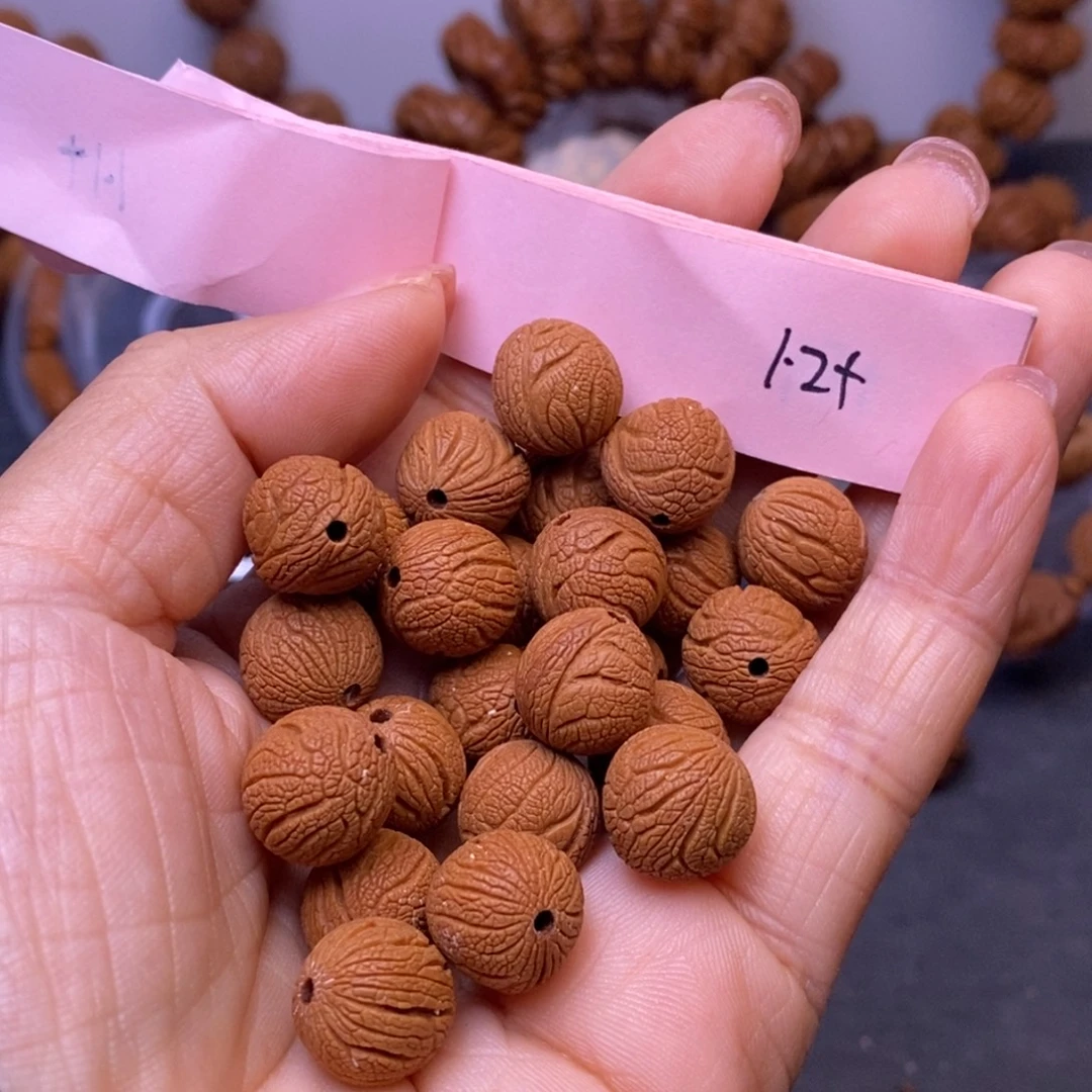 释***生秦岭龙纹桃核28颗