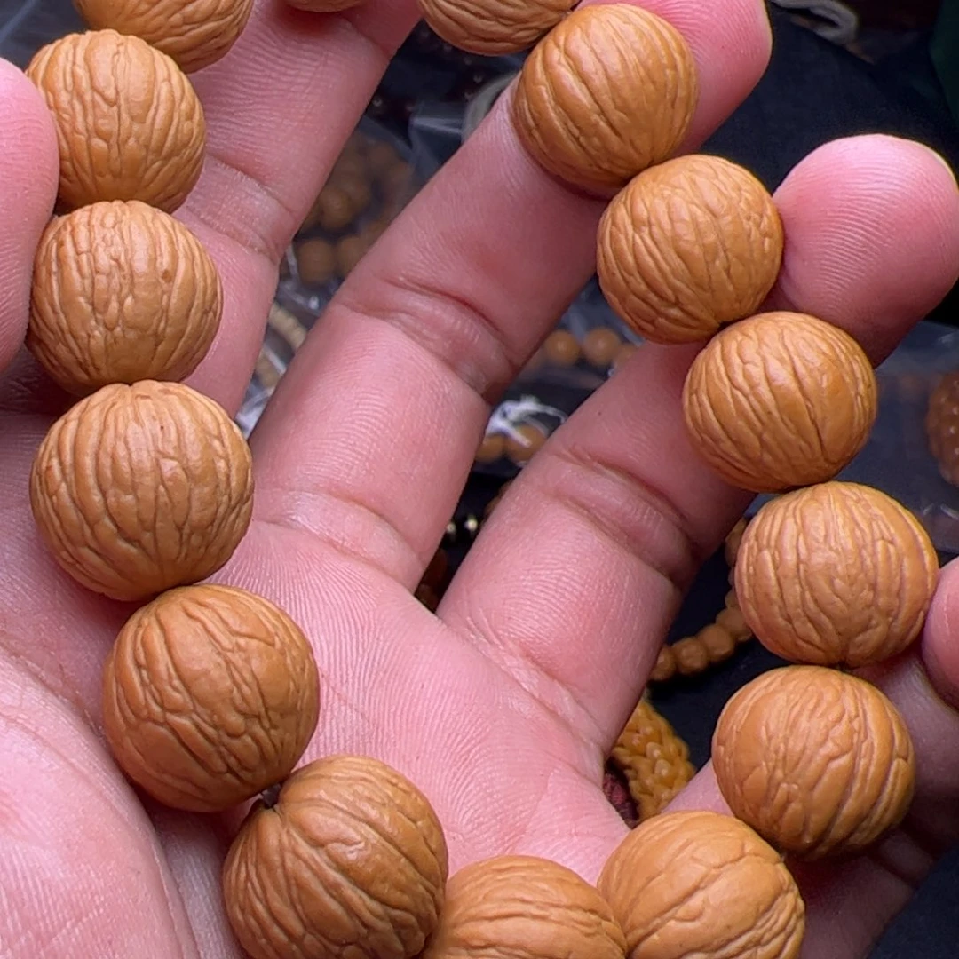 哲***Z猴头核桃吊坠噢距离