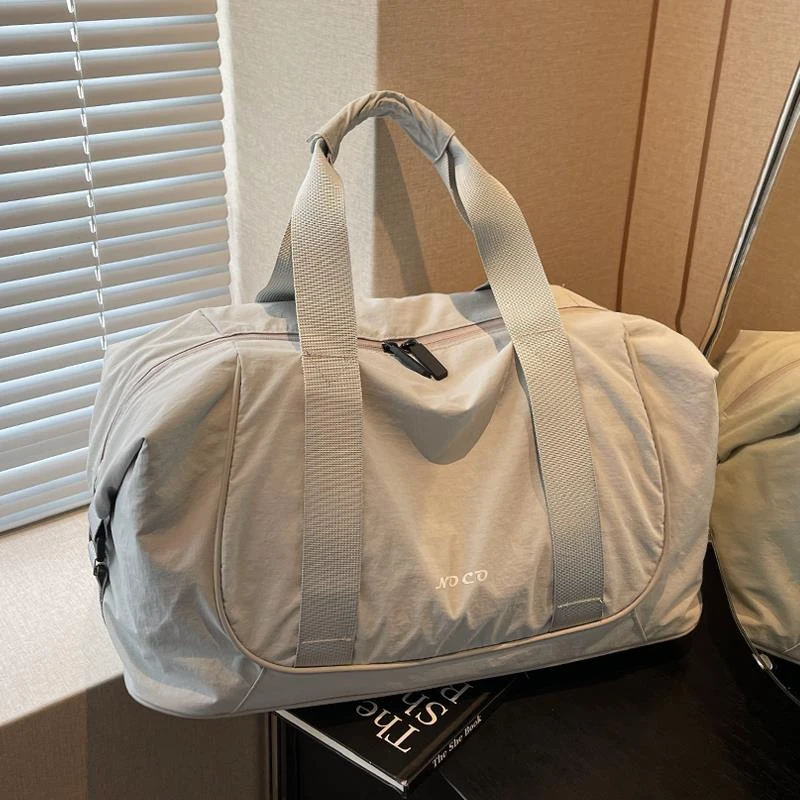 FAVMARTHA大容量手提旅行包女时尚轻便防水行李包男短途出差收纳